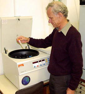 Professor Amos Panet nearby the centrifuge machine