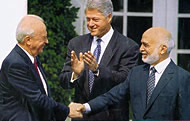 Yitzhak Rabin and King Hussein signing the Israel-Jordan Peace Treaty (1994)