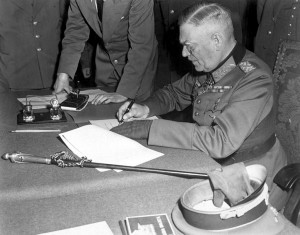 Field Marshall Wilhelm Keitel signing the unconditional surrender of the German Wehrmacht at the Soviet headquarters in Karlshorst, Berlin.