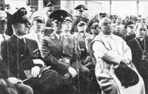 The papal nuncio Marcone (in the white robes of the Dominican order), Archbishop Stepinac next to him, and around them sit leading military representatives of Nazi Germany and the NDH