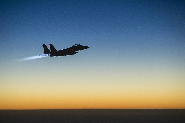A U.S. Air Force F-15E Strike Eagle aircraft flies over northern Iraq Sept. 23, 2014, after conducting airstrikes in Syria On the other hand, in return