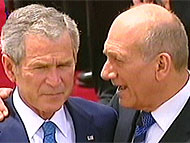 Bush Backs Olmert